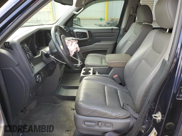 2013 Honda Ridgeline RTL z VIN 5FPYK1F58DB018217, wystawiony jako Copart lot #51644425 z przebiegiem 152 298 mil mil oraz Szkoda całkowita • Salvage title. Historia ofert i sprzedaży dostępna na DreamBid. Obrazek 7.