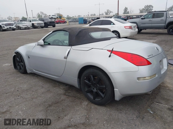 2006 Nissan 350Z Touring with VIN JN1AZ36A36M450659, listed as a IAAI auction lot 42034870 with 77,544 mi miles. Bid and sale history available at carsss.com. Image 3.
