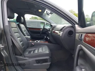 2004 Volkswagen Touareg with VIN WVGCM77L14D045663, listed as a IAAI auction lot 42170895 with 96,709 mi miles and . Bid and sale history available at DreamBid. Image 5.
