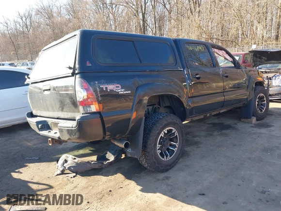 2011 Toyota Tacoma with VIN 3TMLU4EN4BM058738, listed as a IAAI auction lot 41646897 with 117,817 mi miles and . Bid and sale history available at DreamBid. Image 4.
