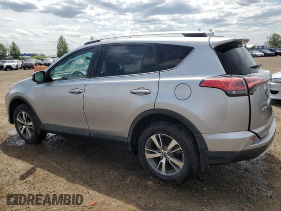 2016 Toyota RAV4 XLE with VIN 2T3RFREV9GW439315, listed as a Copart auction lot 59704345 with 143,198 mi miles and Salvage title. Bid and sale history available at DreamBid. Image 2.