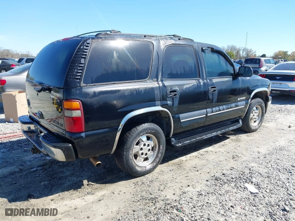 2001 Chevrolet Tahoe LT with VIN 1GNEC13T41J155954, listed as a IAAI auction lot 41810200 with 222,109 mi miles. Bid and sale history available at carsss.com. Image 4.