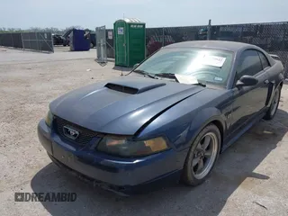 2003 Ford Mustang GT Deluxe with VIN 1FAFP42X63F304318, listed as a IAAI auction lot 42029942 with 83,615 mi miles. Bid and sale history available at carsss.com. Image 2.