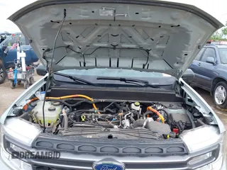 2023 Ford Maverick XL with VIN 3FTTW8E33PRA57039, listed as a IAAI auction lot 42120953 with 18,336 mi miles and . Bid and sale history available at DreamBid. Image 10.