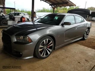 2012 Dodge Charger SRT8 with VIN 2C3CDXEJ1CH240058, listed as a Copart auction lot 73943004 with 72,013 mi miles and Salvage Title. Bid and sale history available at carsss.com. Image 1.