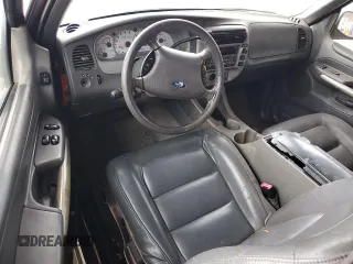 2002 Ford Explorer Sport Value z VIN 1FMYU60E92UC02591, wystawiony jako Copart lot #79090694 z przebiegiem 228 485 mil mil oraz Szkoda całkowita • Salvage title. Historia ofert i sprzedaży dostępna na DreamBid. Obrazek 8.