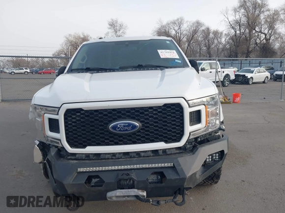 2019 Ford F-150 XL with VIN 1FTEW1EP8KKE13811, listed as a IAAI auction lot 41769452 with 133,146 mi miles and . Bid and sale history available at DreamBid. Image 12.