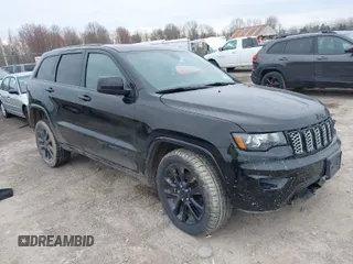 2019 Jeep Grand Cherokee Laredo E with VIN 1C4RJFAGXKC674676, listed as a IAAI auction lot 41942125 with 72,151 mi miles. Bid and sale history available at carsss.com. Image 1.