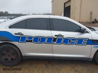 2015 Ford Sedan Police Interceptor with VIN 1FAHP2MK8FG190240, listed as a IAAI auction lot 41570580 with 131,158 mi miles. Bid and sale history available at carsss.com. Image 13.