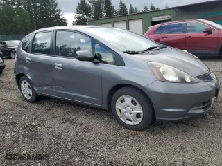 2013 Honda Fit with VIN JHMGE8H38DC081698, listed as a Copart auction lot 53582075 with 74,077 mi miles and Salvage Title. Bid and sale history available at carsss.com. Image 4.