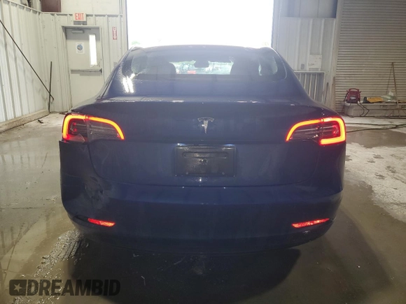 2022 Tesla Model 3 with VIN 5YJ3E1EA7NF369551, listed as a Copart auction lot 55610805 with 128,311 mi miles and Clean Title. Bid and sale history available at DreamBid. Image 6.