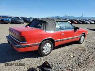 1989 Chrysler LeBaron z VIN 1C3XJ55J9KG275438, wystawiony jako Copart lot #73026764 z przebiegiem 118 347 mil mil oraz Tytuł czysty. Historia ofert i sprzedaży dostępna na DreamBid. Obrazek 3.