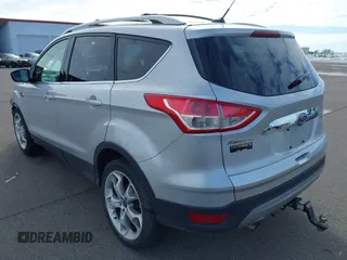 2015 Ford Escape Titanium with VIN 1FMCU9J97FUA05003, listed as a IAAI auction lot 41721214 with 51,644 mi miles. Bid and sale history available at carsss.com. Image 3.