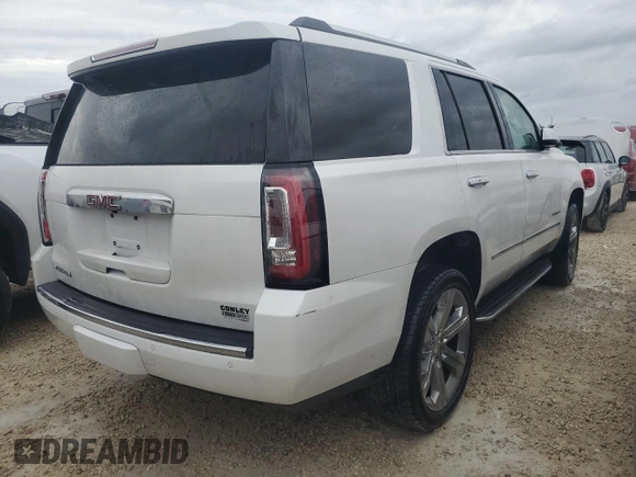 2019 GMC Yukon Denali with VIN 1GKS1CKJ0KR395653, listed as a Copart auction lot 79501764 with 0 mi miles and Salvage Title. Bid and sale history available at carsss.com. Image 3.