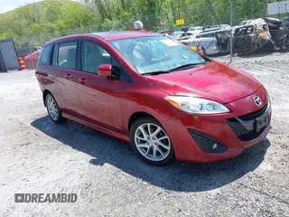 2012 Mazda 5 Grand Touring with VIN JM1CW2DL1C0123418, listed as a IAAI auction lot 42126956 with 112,411 mi miles and . Bid and sale history available at DreamBid. Image 1.