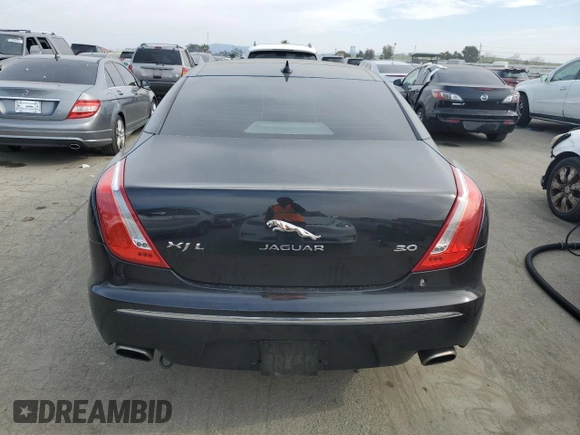 2015 Jaguar XJ with VIN SAJWA2GZ4F8V86379, listed as a Copart auction lot 42624615 with 55,803 mi miles and Salvage Title. Bid and sale history available at carsss.com. Image 6.