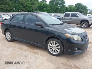 2009 Toyota Corolla with VIN 1NXBU40E19Z135389, listed as a IAAI auction lot 42188550 with 215,054 mi miles. Bid and sale history available at carsss.com. Image 1.