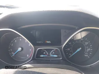 2016 Ford Focus SE with VIN 1FADP3F27GL322186, listed as a IAAI auction lot 42062320 with 131,007 mi miles and . Bid and sale history available at carsss.com. Image 7.