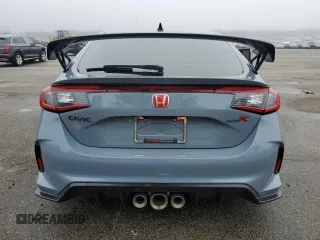 2023 Honda Civic Type R z VIN JHMFL5G40PX003732, wystawiony jako Copart lot #51764935 z przebiegiem 7040 mil mil oraz Szkody całkowita. Historia ofert i sprzedaży dostępna na DreamBid. Obrazek 6.
