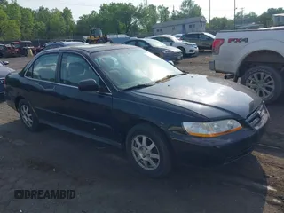 2002 Honda Accord SE z VIN 1HGCG66842A120181, wystawiony jako IAAI lot #42442764 z przebiegiem 148 664 mil mil oraz . Historia ofert i sprzedaży dostępna na DreamBid. Obrazek 1.