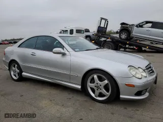 2004 Mercedes-Benz CLK-Class 5.0L with VIN WDBTJ75J04F110990, listed as a Copart auction lot 85511414 with 251,096 mi miles and Salvage Title. Bid and sale history available at carsss.com. Image 4.