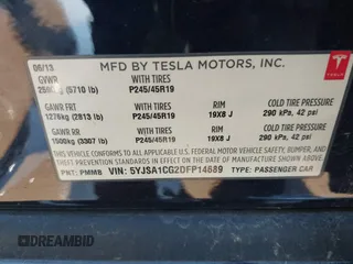 2013 Tesla Model S with VIN 5YJSA1CG2DFP14689, listed as a IAAI auction lot 41648508 with 98,578 mi miles and . Bid and sale history available at carsss.com. Image 9.