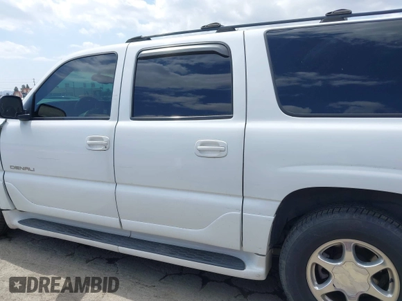 2003 GMC Yukon XL Denali with VIN 1GKFK66UX3J227538, listed as a IAAI auction lot 41915607 with 150,173 mi miles. Bid and sale history available at carsss.com. Image 14.