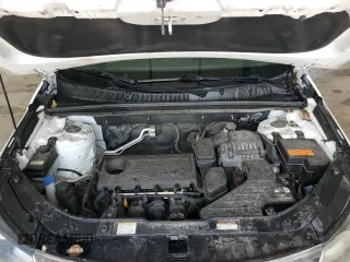 2011 Kia Sorento LX with VIN 5XYKTCA19BG012685, listed as a Copart auction lot 61372885 with 148,857 mi miles and Salvage title. Bid and sale history available at DreamBid. Image 12.