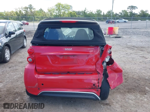2013 Smart fortwo Passion z VIN WMEEK3BA5DK591221, wystawiony jako IAAI lot #42010853 z przebiegiem 101 953 mil mil oraz . Historia ofert i sprzedaży dostępna na DreamBid. Obrazek 16.