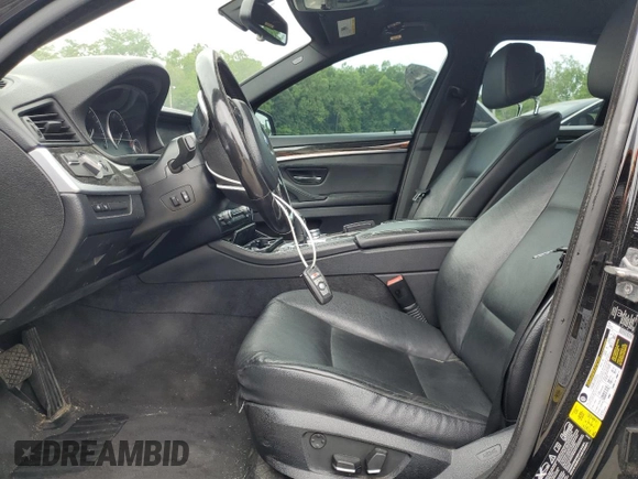 2013 BMW 5 Series 535i xDrive with VIN WBAFU7C59DDU68738, listed as a Copart auction lot 62061725 with 153,052 mi miles and Salvage title. Bid and sale history available at DreamBid. Image 7.