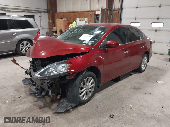 2019 Nissan Sentra S z VIN 3N1AB7AP7KY257283, wystawiony jako IAAI lot #42012338 z przebiegiem 103 503 mil mil oraz . Historia ofert i sprzedaży dostępna na DreamBid. Obrazek 18.