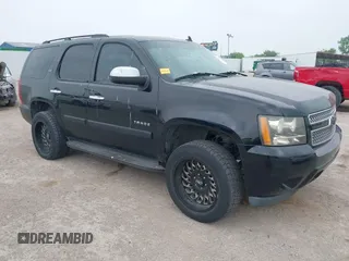 2008 Chevrolet Tahoe LTZ with VIN 1GNFK13018R143737, listed as a IAAI auction lot 42220433 with 198,598 mi miles and . Bid and sale history available at DreamBid. Image 1.