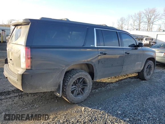 2015 GMC Yukon XL SLT with VIN 1GKS2HKC4FR697416, listed as a Copart auction lot 87887925 with 236,772 mi miles and Salvage Title. Bid and sale history available at carsss.com. Image 3.