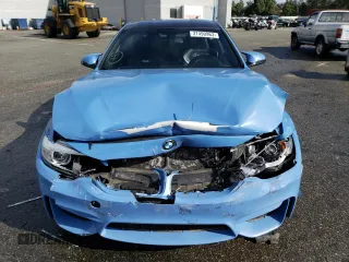 2016 BMW M4 with VIN WBS3R9C54GK337213, listed as a Copart auction lot 37490963 with 56,327 mi miles. Bid and sale history available at carsss.com. Image 5.