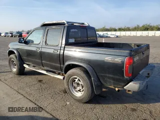 2000 Nissan Frontier XE z VIN 1N6ED27Y2YC369211, wystawiony jako Copart lot #80594884 z przebiegiem 225 194 mil mil oraz Czysty tytuł • Clean title. Historia ofert i sprzedaży dostępna na DreamBid. Obrazek 2.
