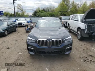 2020 BMW X4 M40i with VIN 5UX2V5C06LLE69603, listed as a Copart auction lot 49705043 with 31,939 mi miles. Bid and sale history available at carsss.com. Image 5.