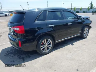 2014 Kia Sorento SX Limited with VIN 5XYKWDA71EG486958, listed as a IAAI auction lot 42483774 with 195,198 mi miles and . Bid and sale history available at DreamBid. Image 4.