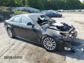 2011 Cadillac CTS Performance with VIN 1G6DK5ED8B0152456, listed as a Copart auction lot 71182634 with Not Provided miles and Salvage Title. Bid and sale history available at DreamBid. Image 4.
