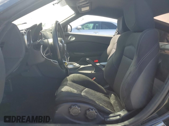 2015 Nissan 370Z with VIN JN1AZ4EH8FM444456, listed as a Copart auction lot 67407134 with 58,513 mi miles and Salvage Title. Bid and sale history available at carsss.com. Image 7.