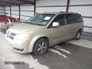2010 Dodge Grand Caravan SXT with VIN 2D4RN5D17AR496854, listed as a IAAI auction lot 42210738 with 213,121 mi miles and . Bid and sale history available at DreamBid. Image 2.