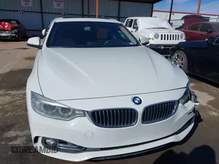 2015 BMW 4 Series 428i with VIN WBA3N3C51FK232902, listed as a IAAI auction lot 41547137 with 136,306 mi miles and . Bid and sale history available at DreamBid. Image 12.