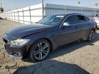 2016 BMW 4 Series 428i z VIN WBA4A9C59GG696298, wystawiony jako Copart lot #52348325 z przebiegiem 87 319 mil mil oraz Szkoda całkowita • Salvage title. Historia ofert i sprzedaży dostępna na DreamBid. Obrazek 1.