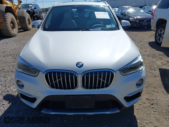 2017 BMW X1 xDrive28i z VIN WBXHT3C32H5F83287, wystawiony jako IAAI lot #42791160 z przebiegiem 69 006 mil mil oraz . Historia ofert i sprzedaży dostępna na DreamBid. Obrazek 12.