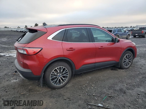 2022 Ford Escape Titanium Plug-In Hybrid z VIN 1FMCU0LZ2NUA23870, wystawiony jako Copart lot #84024854 z przebiegiem 27 759 mil mil oraz Szkoda całkowita • Salvage title. Historia ofert i sprzedaży dostępna na DreamBid. Obrazek 3.