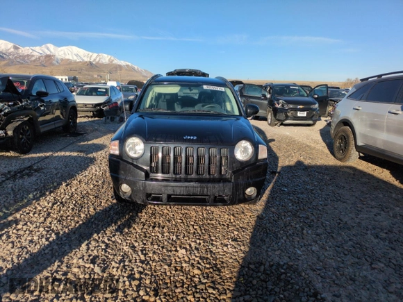 2009 Jeep Compass North with VIN 1J4FT47B89D189562, listed as a Copart auction lot 48285415 with 89,377 mi miles and Salvage Title. Bid and sale history available at carsss.com. Image 5.