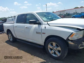 2014 Ram 1500 Big Horn with VIN 1C6RR7LT5ES346575, listed as a IAAI auction lot 42554655 with 171,811 mi miles and . Bid and sale history available at DreamBid. Image 13.