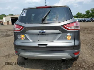 2014 Ford Escape SE с VIN 1FMCU9GX9EUD73493, выставлен на аукционе Copart как лот 60605385 с пробегом 123 236 миль миль и Списание • Salvage title. История ставок и продаж доступна на DreamBid. Изображение 6.