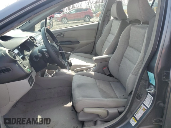 2011 Honda Insight EX with VIN JHMZE2H75BS008221, listed as a Copart auction lot 51910115 with 82,670 mi miles and Salvage Title. Bid and sale history available at DreamBid. Image 7.
