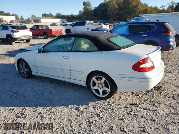 2009 Mercedes-Benz CLK-Class 3.5L with VIN WDBTK56FX9T108328, listed as a Copart auction lot 74586884 with 49,660 mi miles and Salvage Title. Bid and sale history available at carsss.com. Image 2.
