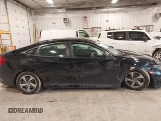 2019 Honda Civic Sedan LX with VIN 2HGFC2F69KH555697, listed as a IAAI auction lot 41664312 with 112,993 mi miles. Bid and sale history available at carsss.com. Image 13.
